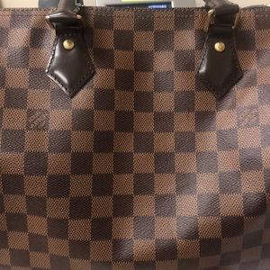 Authentic!! Louis Vuitton pocketbook.